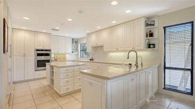Coastal elegance meets island living in Bay Isles Bayou on on Longboat Key Golf Club Resort in Florida - for sale on GolfHomes.com, golf home, golf lot