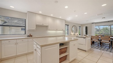 Coastal elegance meets island living in Bay Isles Bayou on on Longboat Key Golf Club Resort in Florida - for sale on GolfHomes.com, golf home, golf lot