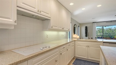 Coastal elegance meets island living in Bay Isles Bayou on on Longboat Key Golf Club Resort in Florida - for sale on GolfHomes.com, golf home, golf lot