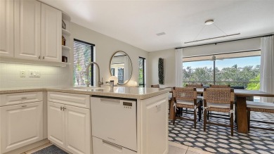 Coastal elegance meets island living in Bay Isles Bayou on on Longboat Key Golf Club Resort in Florida - for sale on GolfHomes.com, golf home, golf lot