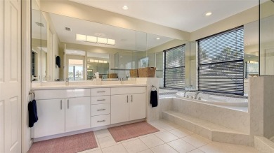 Coastal elegance meets island living in Bay Isles Bayou on on Longboat Key Golf Club Resort in Florida - for sale on GolfHomes.com, golf home, golf lot