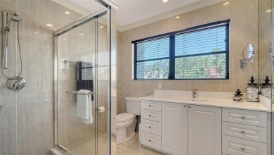 Coastal elegance meets island living in Bay Isles Bayou on on Longboat Key Golf Club Resort in Florida - for sale on GolfHomes.com, golf home, golf lot
