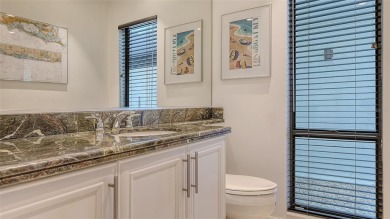 Coastal elegance meets island living in Bay Isles Bayou on on Longboat Key Golf Club Resort in Florida - for sale on GolfHomes.com, golf home, golf lot