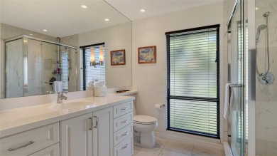 Coastal elegance meets island living in Bay Isles Bayou on on Longboat Key Golf Club Resort in Florida - for sale on GolfHomes.com, golf home, golf lot