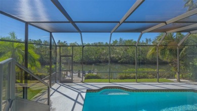 Coastal elegance meets island living in Bay Isles Bayou on on Longboat Key Golf Club Resort in Florida - for sale on GolfHomes.com, golf home, golf lot