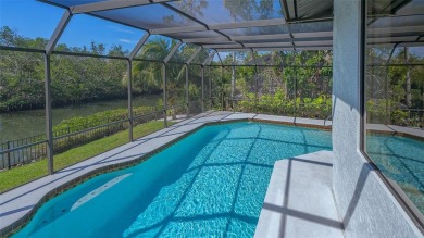 Coastal elegance meets island living in Bay Isles Bayou on on Longboat Key Golf Club Resort in Florida - for sale on GolfHomes.com, golf home, golf lot
