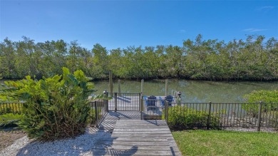 Coastal elegance meets island living in Bay Isles Bayou on on Longboat Key Golf Club Resort in Florida - for sale on GolfHomes.com, golf home, golf lot