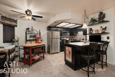 Discover this highly desirable lower-level unit in the Rock on The Oasis Golf Club in Nevada - for sale on GolfHomes.com, golf home, golf lot