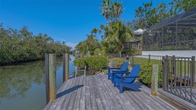 Coastal elegance meets island living in Bay Isles Bayou on on Longboat Key Golf Club Resort in Florida - for sale on GolfHomes.com, golf home, golf lot