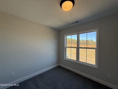 Premium lot! Discover this stunning MOVE IN READY home in on Riverwood Golf and Athletic Club in North Carolina - for sale on GolfHomes.com, golf home, golf lot