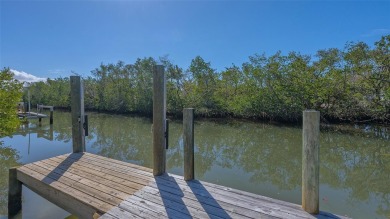 Coastal elegance meets island living in Bay Isles Bayou on on Longboat Key Golf Club Resort in Florida - for sale on GolfHomes.com, golf home, golf lot