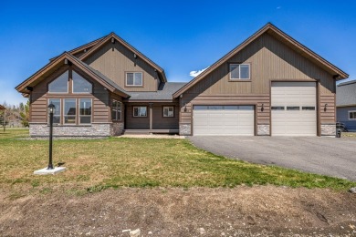 This 3,260 sq ft 4-bedroom, 2.5-bathroom home with a bonus room on McCall Municipal Golf Course in Idaho - for sale on GolfHomes.com, golf home, golf lot