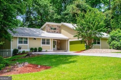 This 3-bedroom, 2-bathroom home offers modern comfort with a on Fairfield Plantation Golf and Country Club in Georgia - for sale on GolfHomes.com, golf home, golf lot