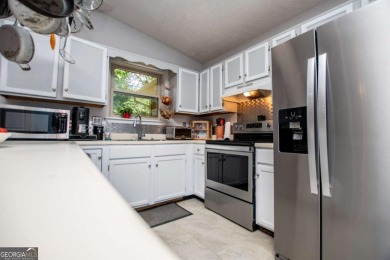 This 3-bedroom, 2-bathroom home offers modern comfort with a on Fairfield Plantation Golf and Country Club in Georgia - for sale on GolfHomes.com, golf home, golf lot