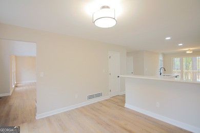 Renovations are complete! This huge home comes complete with a on Brookstone Golf and Country Club in Georgia - for sale on GolfHomes.com, golf home, golf lot