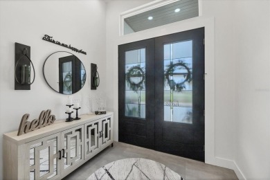 Gulf Access Luxury Living -  Smart, Secure and Storm Ready! 
 on Rotonda Golf and Country Club - Long Marsh  in Florida - for sale on GolfHomes.com, golf home, golf lot