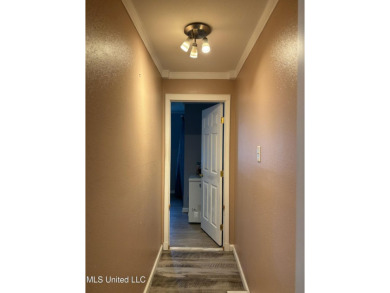 This charming 2 bedroom/2 bath home sits in a picturesque golf on The Bridges Golf Club At Hollywood Casino in Mississippi - for sale on GolfHomes.com, golf home, golf lot