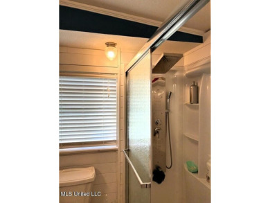 This charming 2 bedroom/2 bath home sits in a picturesque golf on The Bridges Golf Club At Hollywood Casino in Mississippi - for sale on GolfHomes.com, golf home, golf lot