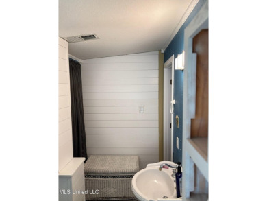 This charming 2 bedroom/2 bath home sits in a picturesque golf on The Bridges Golf Club At Hollywood Casino in Mississippi - for sale on GolfHomes.com, golf home, golf lot