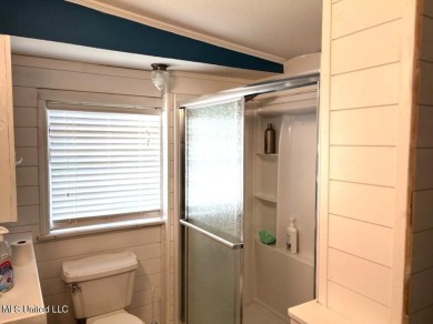 This charming 2 bedroom/2 bath home sits in a picturesque golf on The Bridges Golf Club At Hollywood Casino in Mississippi - for sale on GolfHomes.com, golf home, golf lot