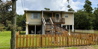 This charming 2 bedroom/2 bath home sits in a picturesque golf on The Bridges Golf Club At Hollywood Casino in Mississippi - for sale on GolfHomes.com, golf home, golf lot