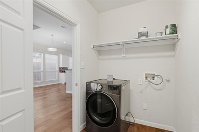 What a beautiful 4-bedroom, 2.5-bath  home in the heart of on Heritage Lakes - Par 3 - 9 Hole Course in Texas - for sale on GolfHomes.com, golf home, golf lot