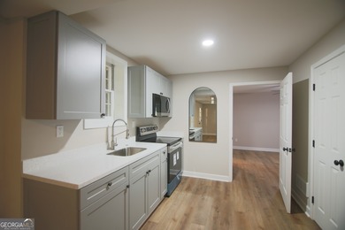 Renovations are complete! This huge home comes complete with a on Brookstone Golf and Country Club in Georgia - for sale on GolfHomes.com, golf home, golf lot