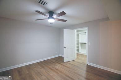 Renovations are complete! This huge home comes complete with a on Brookstone Golf and Country Club in Georgia - for sale on GolfHomes.com, golf home, golf lot