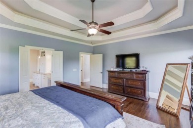 Discover unparalleled luxury at 1776 Traditions Way, an on Traditions of Braselton Golf Club in Georgia - for sale on GolfHomes.com, golf home, golf lot