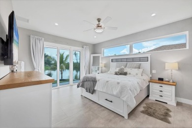 Gulf Access Luxury Living -  Smart, Secure and Storm Ready! 
 on Rotonda Golf and Country Club - Long Marsh  in Florida - for sale on GolfHomes.com, golf home, golf lot