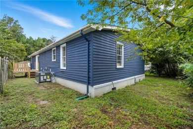 Welcome to this stunning, fully renovated home just minutes from on Red Wing Lake Golf Course in Virginia - for sale on GolfHomes.com, golf home, golf lot