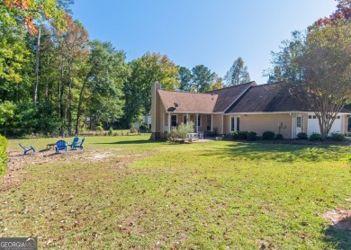 Perfect Location! This beautiful home is situated on the 17th on Canongate On White Oak Golf Course in Georgia - for sale on GolfHomes.com, golf home, golf lot