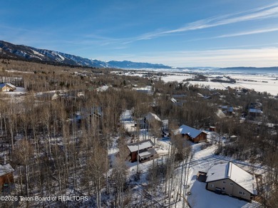 Tucked among the aspen and pines in Star Valley Ranch, this on Star Valley RV Golf Course in Wyoming - for sale on GolfHomes.com, golf home, golf lot