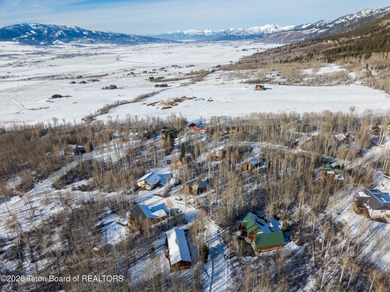 Tucked among the aspen and pines in Star Valley Ranch, this on Star Valley RV Golf Course in Wyoming - for sale on GolfHomes.com, golf home, golf lot