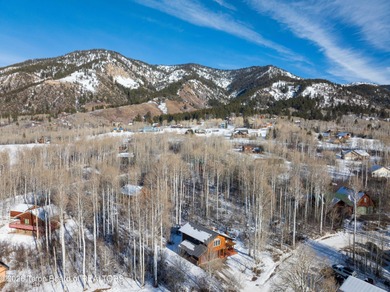 Tucked among the aspen and pines in Star Valley Ranch, this on Star Valley RV Golf Course in Wyoming - for sale on GolfHomes.com, golf home, golf lot