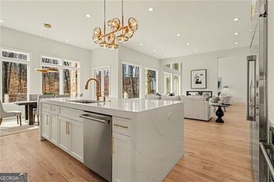 Set on a private 2.3-acre creek-lined homesite in the on Echelon Golf Club in Georgia - for sale on GolfHomes.com, golf home, golf lot