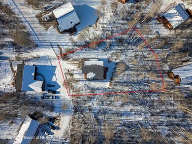 Tucked among the aspen and pines in Star Valley Ranch, this on Star Valley RV Golf Course in Wyoming - for sale on GolfHomes.com, golf home, golf lot