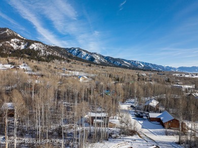 Tucked among the aspen and pines in Star Valley Ranch, this on Star Valley RV Golf Course in Wyoming - for sale on GolfHomes.com, golf home, golf lot