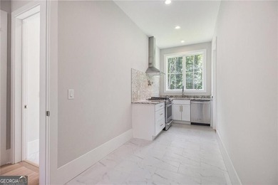 Set on a private 2.3-acre creek-lined homesite in the on Echelon Golf Club in Georgia - for sale on GolfHomes.com, golf home, golf lot