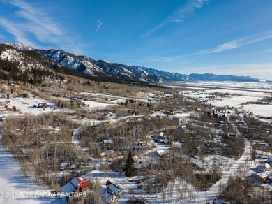 Tucked among the aspen and pines in Star Valley Ranch, this on Star Valley RV Golf Course in Wyoming - for sale on GolfHomes.com, golf home, golf lot