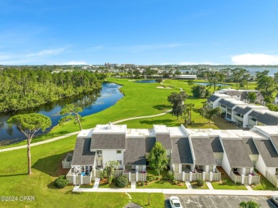 Love the green grass of HOME but not a fan of yard maintenance? on Bay Point Resort Golf Club in Florida - for sale on GolfHomes.com, golf home, golf lot