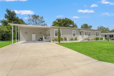 This beautifully maintained 3-bedroom, 2-bath home sits on a on Brookridge Country Club in Florida - for sale on GolfHomes.com, golf home, golf lot