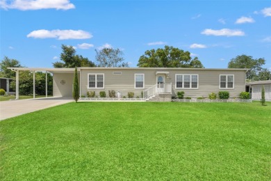 This beautifully maintained 3-bedroom, 2-bath home sits on a on Brookridge Country Club in Florida - for sale on GolfHomes.com, golf home, golf lot