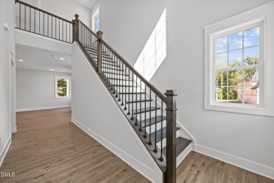 Welcome home to this spacious 4-bedroom, 2.5-bath residence on Olde Liberty Golf and Country Club in North Carolina - for sale on GolfHomes.com, golf home, golf lot