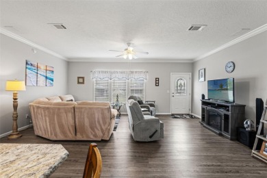 This beautifully maintained 3-bedroom, 2-bath home sits on a on Brookridge Country Club in Florida - for sale on GolfHomes.com, golf home, golf lot