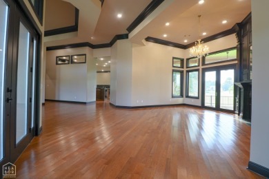 This stunning all-brick home, has been completely remodeled to on RidgePointe Country Club in Arkansas - for sale on GolfHomes.com, golf home, golf lot