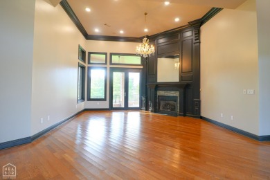 This stunning all-brick home, has been completely remodeled to on RidgePointe Country Club in Arkansas - for sale on GolfHomes.com, golf home, golf lot