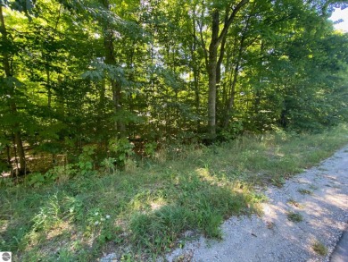 Wooded 0.34-acre parcel in the Sugar Loaf Chalets neighborhood on Sugar Loaf The Old Course in Michigan - for sale on GolfHomes.com, golf home, golf lot