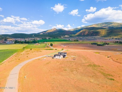 Set along the southern boundary in the gated community of on Gypsum Creek Golf Course in Colorado - for sale on GolfHomes.com, golf home, golf lot