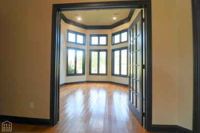 This stunning all-brick home, has been completely remodeled to on RidgePointe Country Club in Arkansas - for sale on GolfHomes.com, golf home, golf lot
